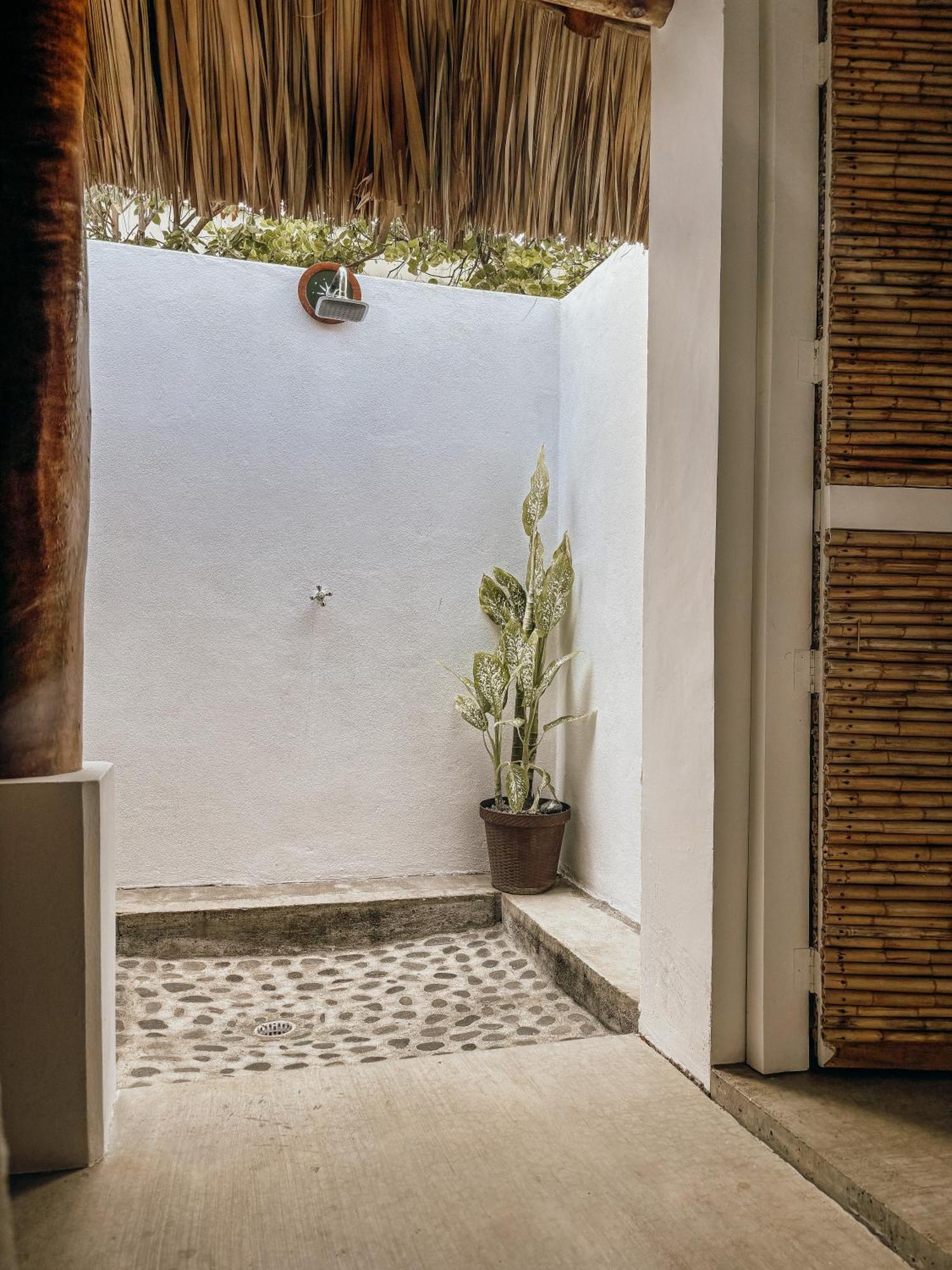Nimbu Beachhouse Transito Luaran gambar