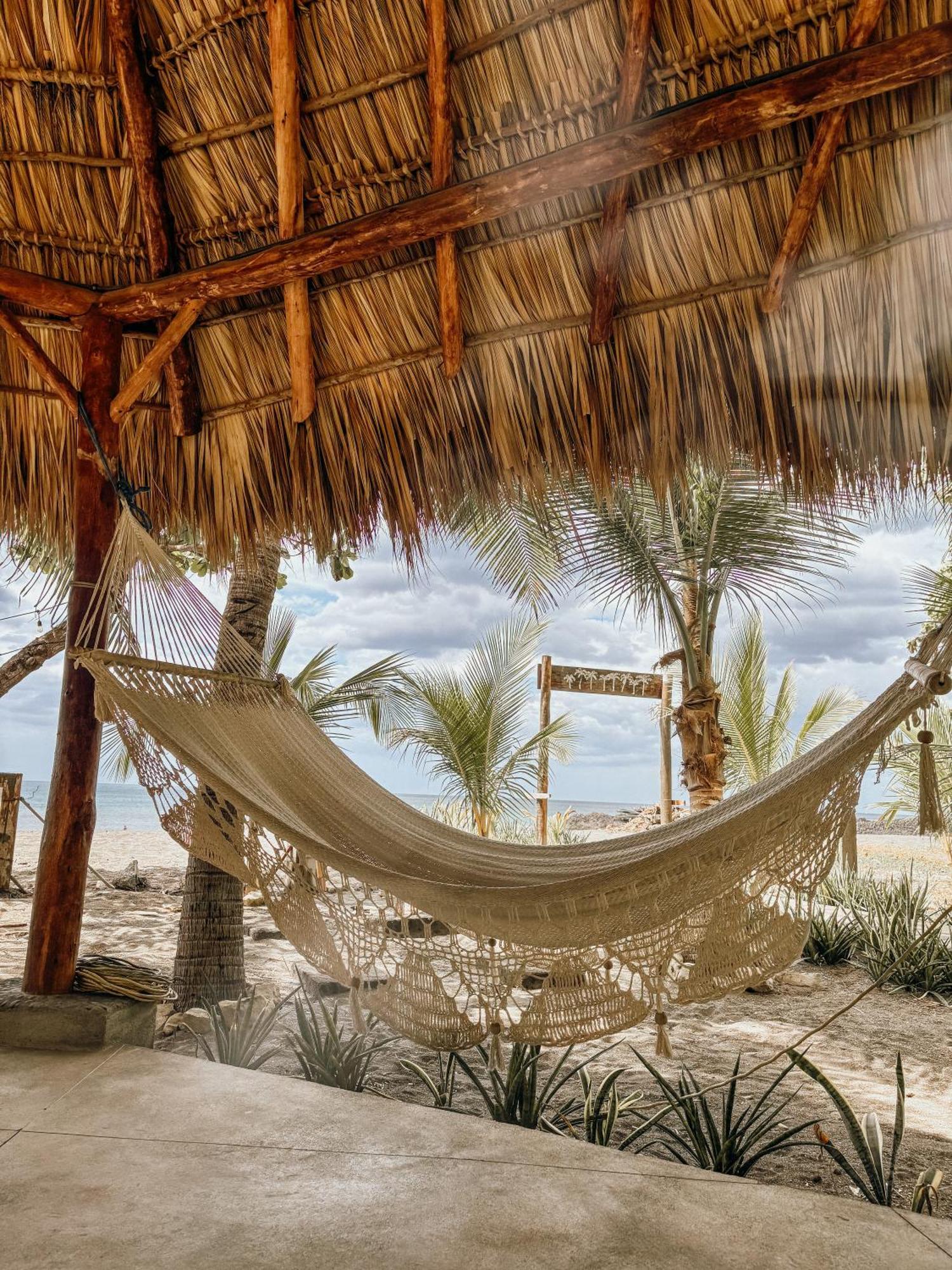 Nimbu Beachhouse Transito Luaran gambar