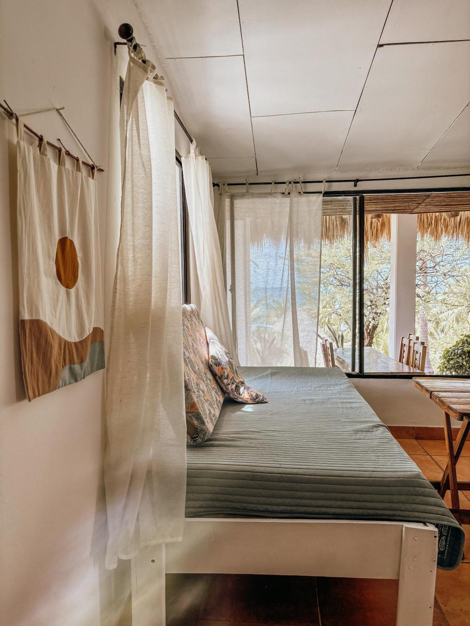 Nimbu Beachhouse Transito Luaran gambar